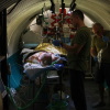 Ukrainian military medics treat a wounded Ukrainian soldier at a field hospital near the front line in the southeastern region of Zaporizhzhia on September 12. The vast majority of casualties occur in the so-called kill zone, a band about 10 to 15 miles wide on both sides of the front line that stretches more than 700 miles from north to south.