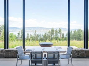 The dining room at Home Block, the restaurant at CedarCreek Estate Winery in Kelowna, BC, overlooks the estate and Okanagan Lake.
