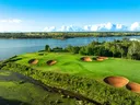 Don't let the views of the Brudenell River from the signature eighth hole at Dundarave Golf Course in Cardigan, PEI, distract you from the task at hand - try to steer the trademark red bunker.